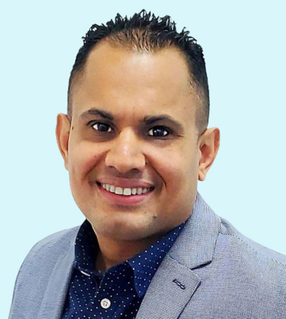 Portrait of Junior Espinal, FNP