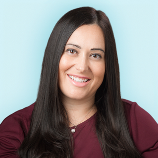 Portrait of Jill Coccaro-Santos, FNP