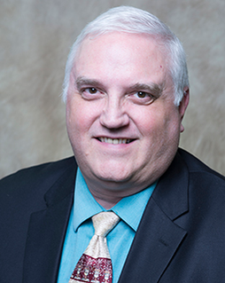 Portrait of Leslie (Dean) Poppe, PhD