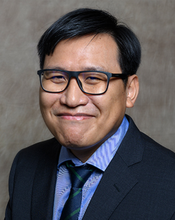 Portrait of Phuc (Bruce) Huynh, DO
