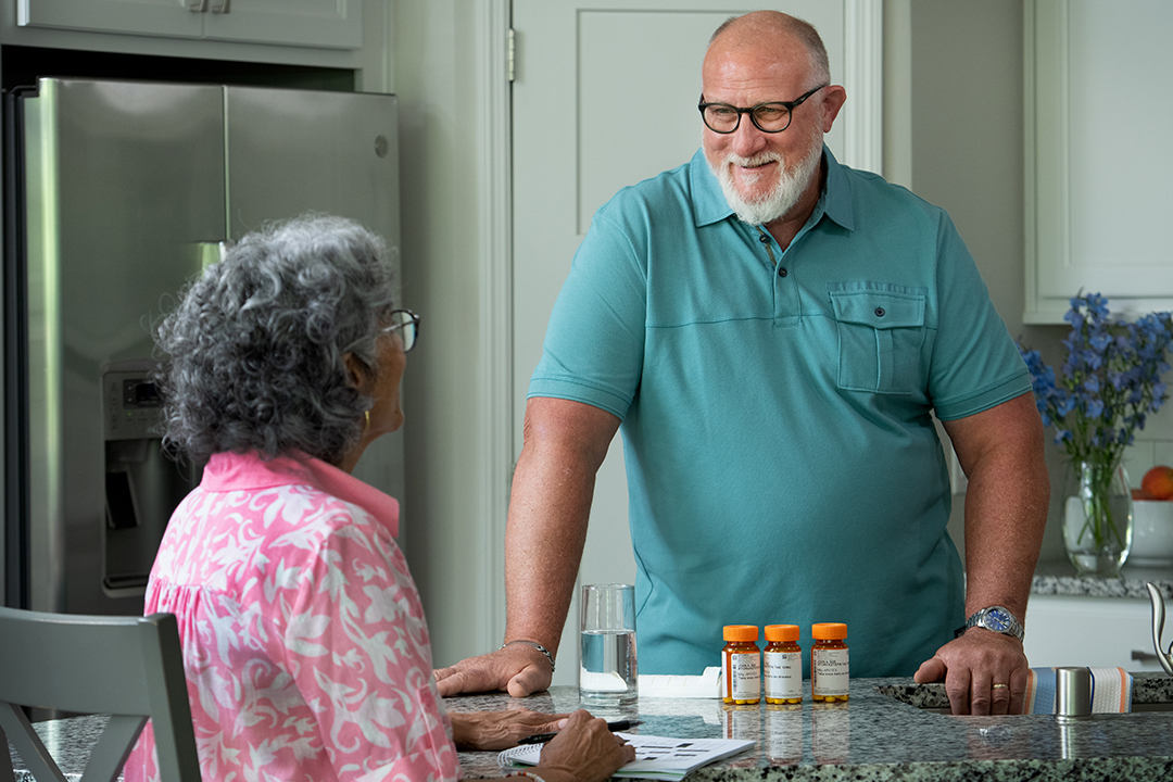 Man recieving pharmacy package