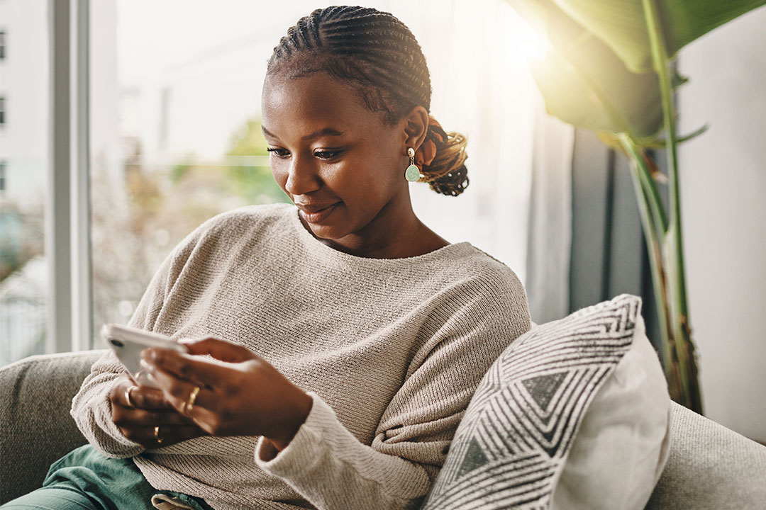 https://www.optum.com/content/dam/optum4/images/business/financial/1080x720/1080x720-hsa-calculator-woman-on-couch-looking-at-phone.jpg