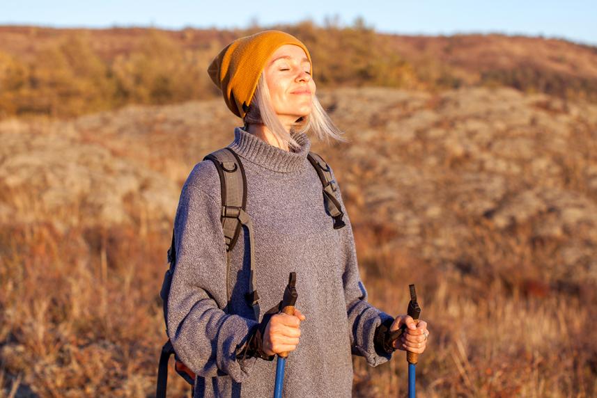 Person hiking to relieve stress from caregiving