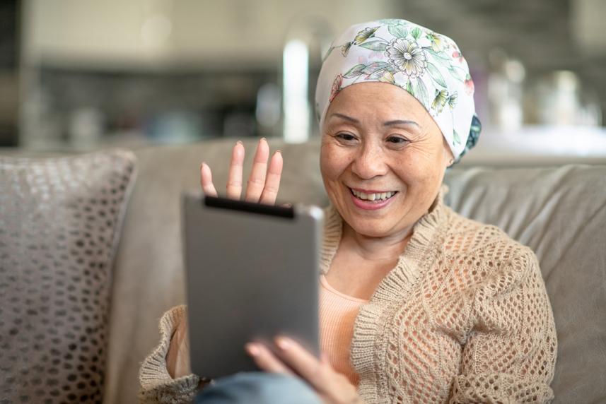 Senior female on the couch using a tablet