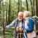 Older couple walking in the woods