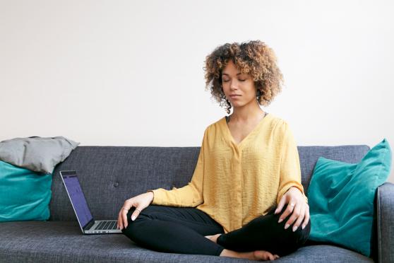 Woman mediating to relieve stress and anxiety