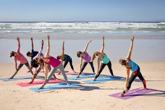 A yoga class at the beach