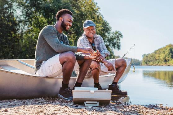 Two men fishing and taking care of their mental health